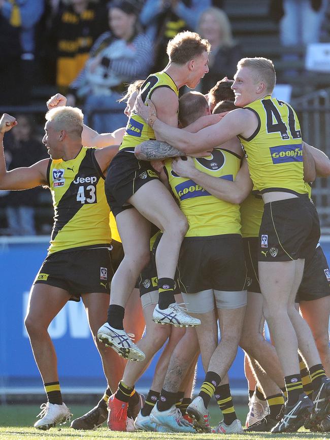 The VFL Tigers celebrate on the final siren. Pic: Michael Klein.