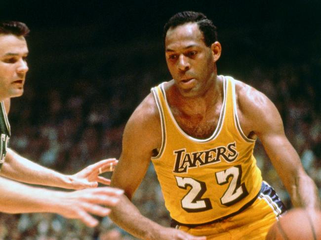 INGLEWOOD, CA - 1965: Elgin Baylor #22 of the Los Angeles Lakers drives against the Boston Celtics circa 1965 at the Great Western Forum in Inglewood, California. NOTE TO USER: User expressly acknowledges and agrees that, by downloading and or using this photograph, User is consenting to the terms and conditions of the Getty Images License Agreement. Mandatory Copyright Notice: Copyright 1965 NBAE (Photo by NBA Photos/NBAE via Getty Images)