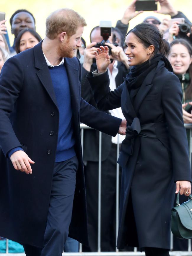 Prince Harry and Meghan Markle are seen during a walkabout at Cardiff Castle on January 18, 2018 in Cardiff, Wales. Picture: Getty