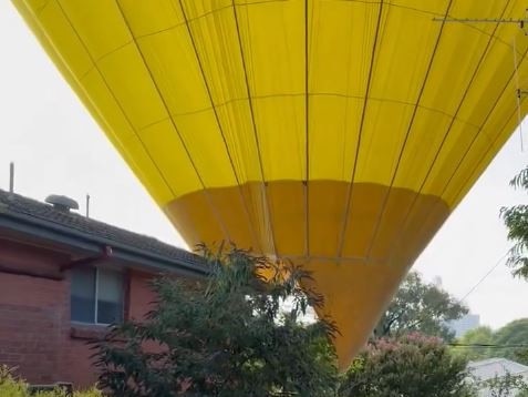 Residents in the western Canberra suburb of Lyons were startled to see a balloon crash into two suburban backyards. Picture: Supplied/Matthew Cossey