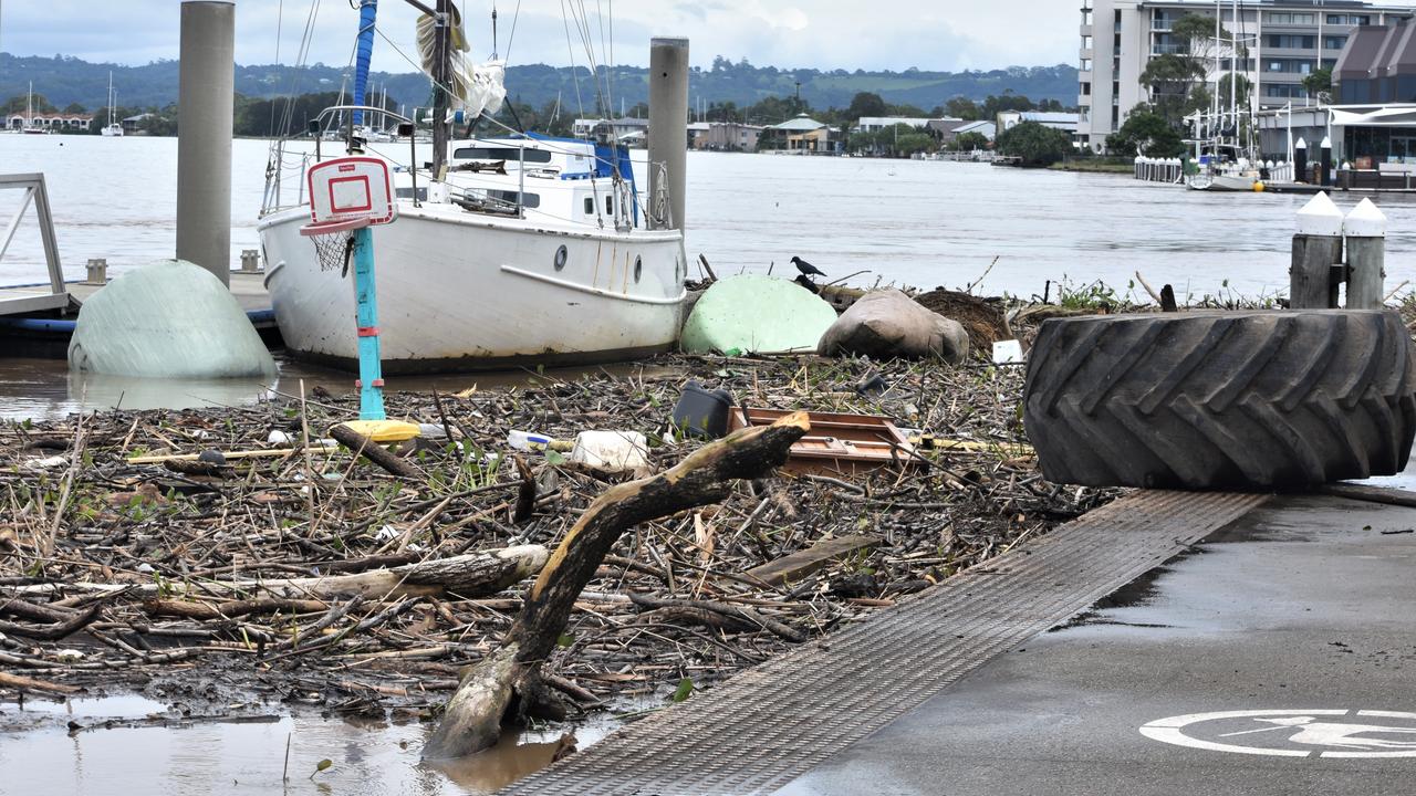 A tractor tyre and children's basketball hoop are among items washed up in the Richmond River, Ballina on March 4,2022. Picture: Tessa Flemming