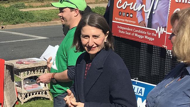 Premier Gladys Berejiklian was all smiles while campaigning outside a polling booth in Wagga Wagga.