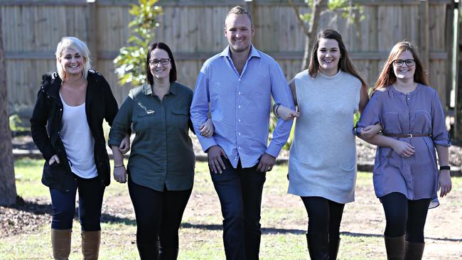 Five of the six  children of Brisbane MH370 passengers Bob and Cathy Lawton and Rod and Mary Burrows come together for a park renaming in honour of their parents. From left: Amanda Lawton, Glenda Brinckman, Jayden Burrows and Karla McMaster and Melissa Lawton. Picture: Annette Dew