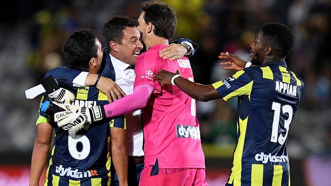 The Mariners rejoice at a surprise result (AAP Image/Dan Himbrechts)