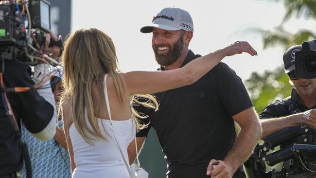 Dustin Johnson hugs Paulina Gretzky after winning the team championship stroke-play round of the LIV Golf Invitational. (Photo by Eric Espada/Getty Images)