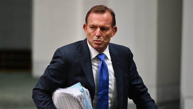 Former prime minister Tony Abbott leaves after Question Time in the House of Representatives at Parliament House in Canberra, Thursday, October 25, 2018. (AAP Image/Mick Tsikas) NO ARCHIVING