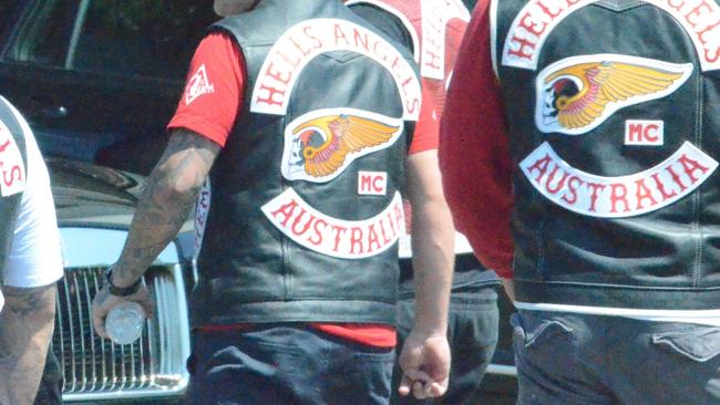 Police intelligence photos of the Hells Angels motorcycle gang focusing on their insignia.