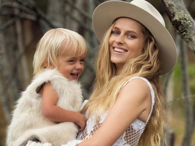 Palmer poses with one of her entourage, her angelic son Bodhi Rain.