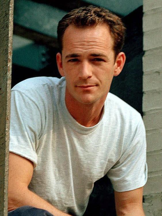 Luke Perry in 1991. He was hospitalised the same day Fox announced it was rebooting <i>90210</i>. Picture; AP/