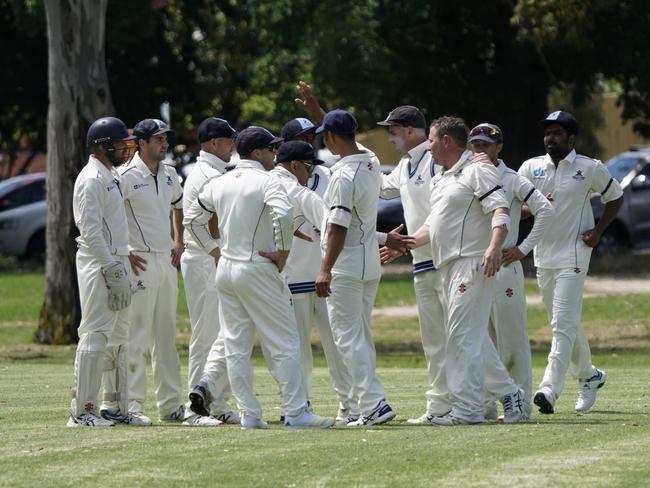 Buckley Ridges players celebrate a Narre South wicket. Picture: Valeriu Campan