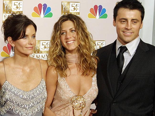 (FILES) Cast members from "Friends" (L-R) David Schwimmer, Lisa Kudrow, Mathew Perry, Courtney Cox Arquette, Jennifer Aniston, and Matt LeBlanc, pose for photographers at the 54th Annual Emmy Awards at the Shrine Auditorium in Los Angeles, California, on September 22, 2002. "Friends" stars Jennifer Aniston, David Schwimmer and Lisa Kudrow paid their own personal tributes to the late Matthew Perry on November 15, 2023, mourning their beloved but troubled co-star after his shock death last month. Perry, who played Chandler Bing on the hit TV sitcom from 1994-2004, died at the age of 54, having struggled for decades with addiction and related serious health issues. (Photo by LEE CELANO / AFP)