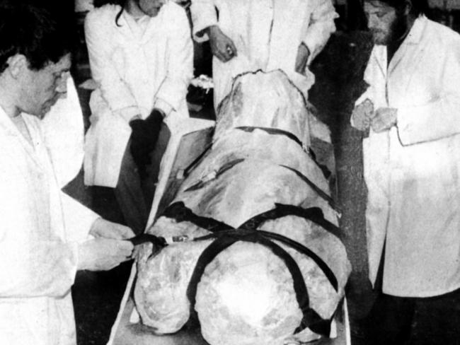 Attendants prepare a body for cryonic suspension at the Trans Time Inc facility in San Francisco, California in the 1990s. Picture: Supplied.