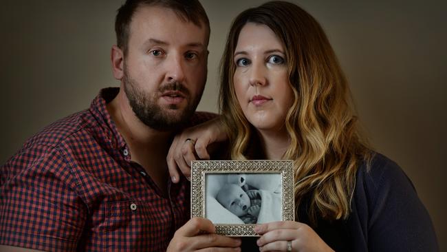 WA Parents of Riley Hughes who passed away from whooping cough. They've been campaigning to encourage parents to vaccinate againt whooping cough, with great success. Photo by Daniel Wilkins. PICTURED - Greg and Catherine Hughes, with a photo of Riley.