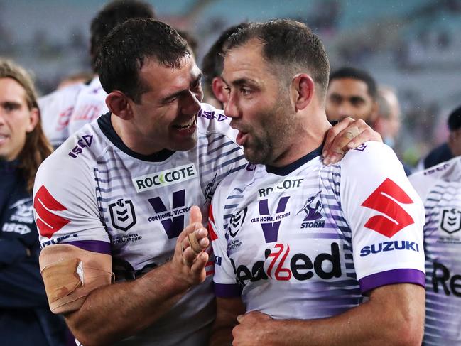 SYDNEY, AUSTRALIA - OCTOBER 25: Dale Finucane of the Storm and Cameron Smith of the Storm celebrate after winning the 2020 NRL Grand Final match between the Penrith Panthers and the Melbourne Storm at ANZ Stadium on October 25, 2020 in Sydney, Australia. (Photo by Cameron Spencer/Getty Images)