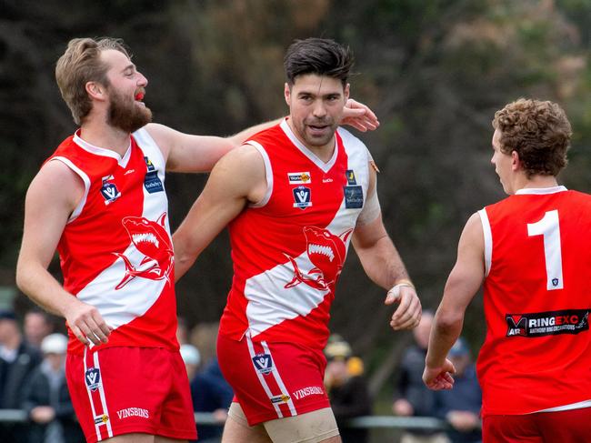 Peninsular football league club Sorrento versus Frankston at Sorrento. A look behind the scenes of the day. Sorrento's Leigh Poholke congratulates Chris Dawes on his goal.Picture: Jay Town