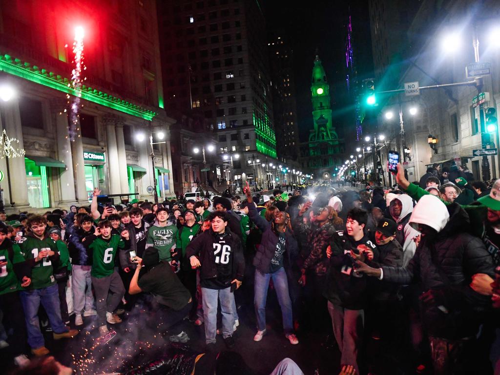 Philadelphia's Wild Celebration: Champagne, Fireworks, and Climbing Poles