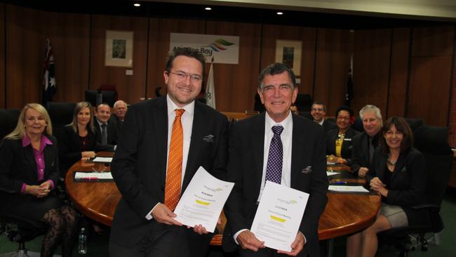 Councillors Matt Constance and Acting Mayor Mike Charlton with other Moreton Bay Regional Councillors after adopting the 2019/2020 budget. Photo Erin Smith