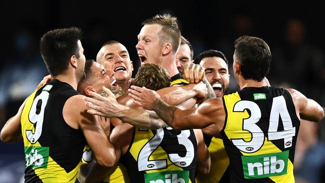 Richmond players celebrate a hard-fought win.