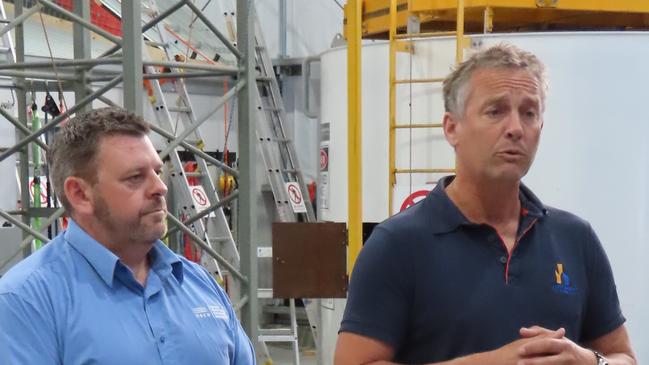 National Electrical and Communications Association State Manager Ben Shaw and Master Builders Tasmania CEO David Clerk speak to the media at Cambridge on Wednesday, December 18, 2024.