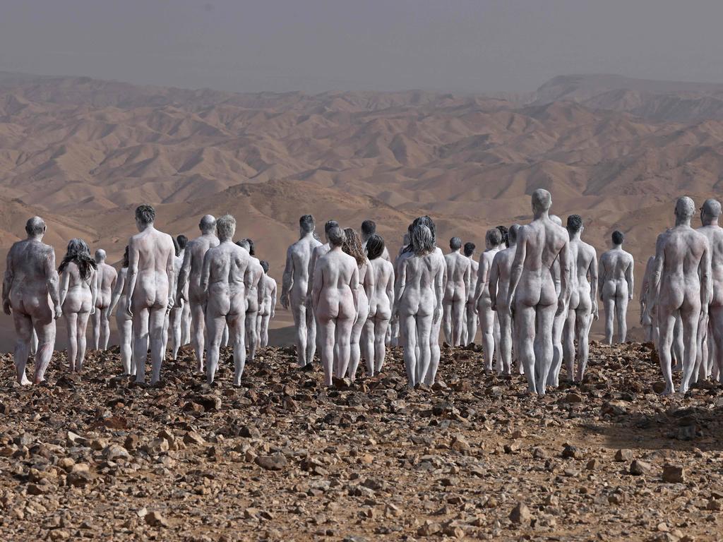 Participants pose nude for American art photographer Spencer Tunick. Picture: Menahem Kahana/AFP