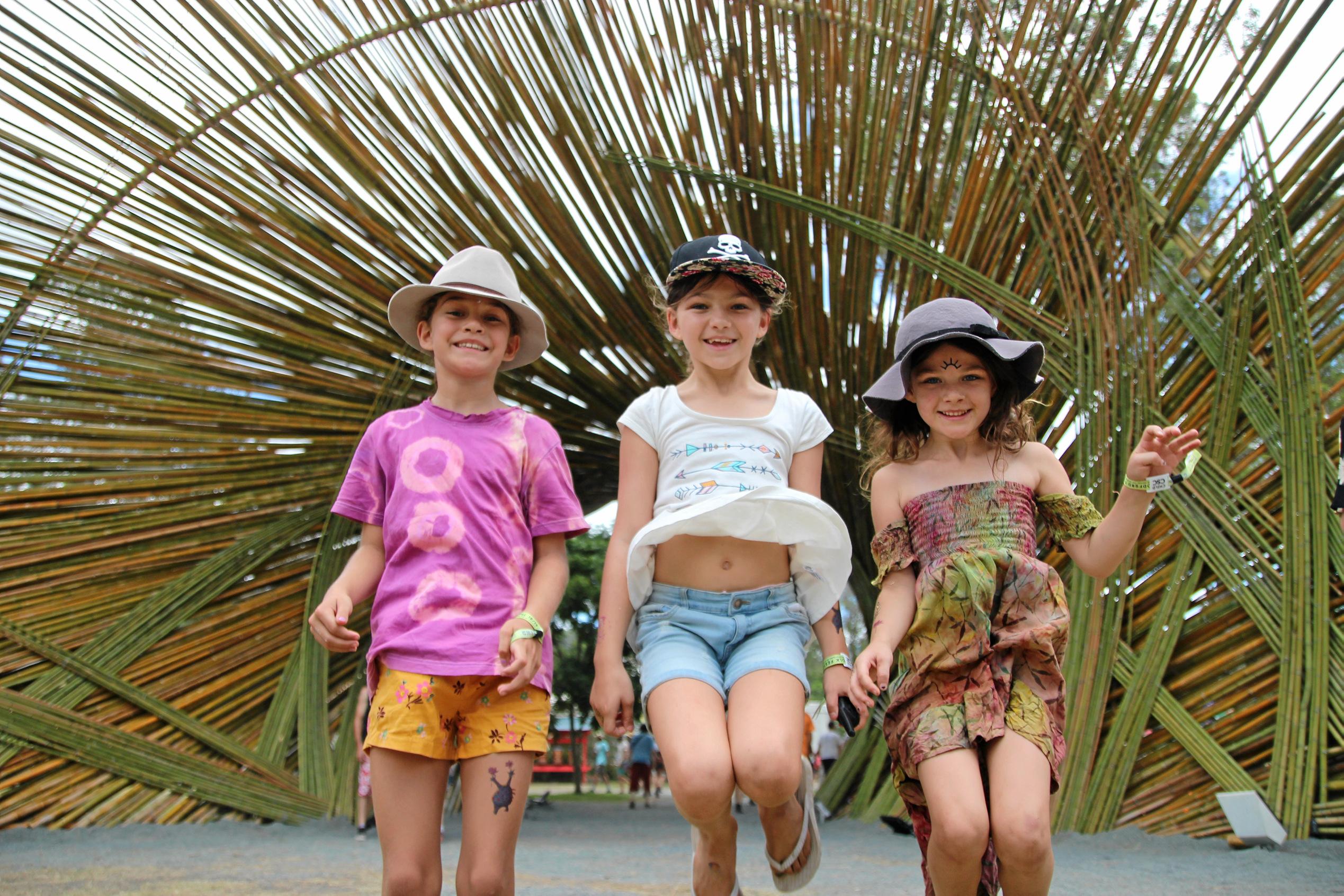 Isis, Koko and Evve Murphy at the entrance to Woodford Folk Festival.