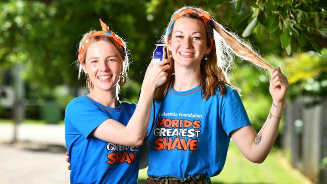 Friends Dani and Claire are shaving their head at Cotters Market Townsville for World's Greatest Shave. Picture: Alix Sweeney