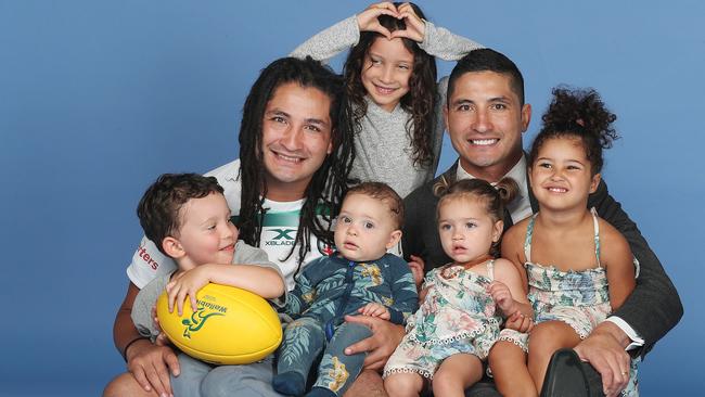 Twins Saia (left) with kids Saia Junior, 3, Sienna, 5, and Soli, 9 months, and Anthony with his kids Malia, 3, and Gia, 1. Photo: Annette Dew, The Courier-Mail