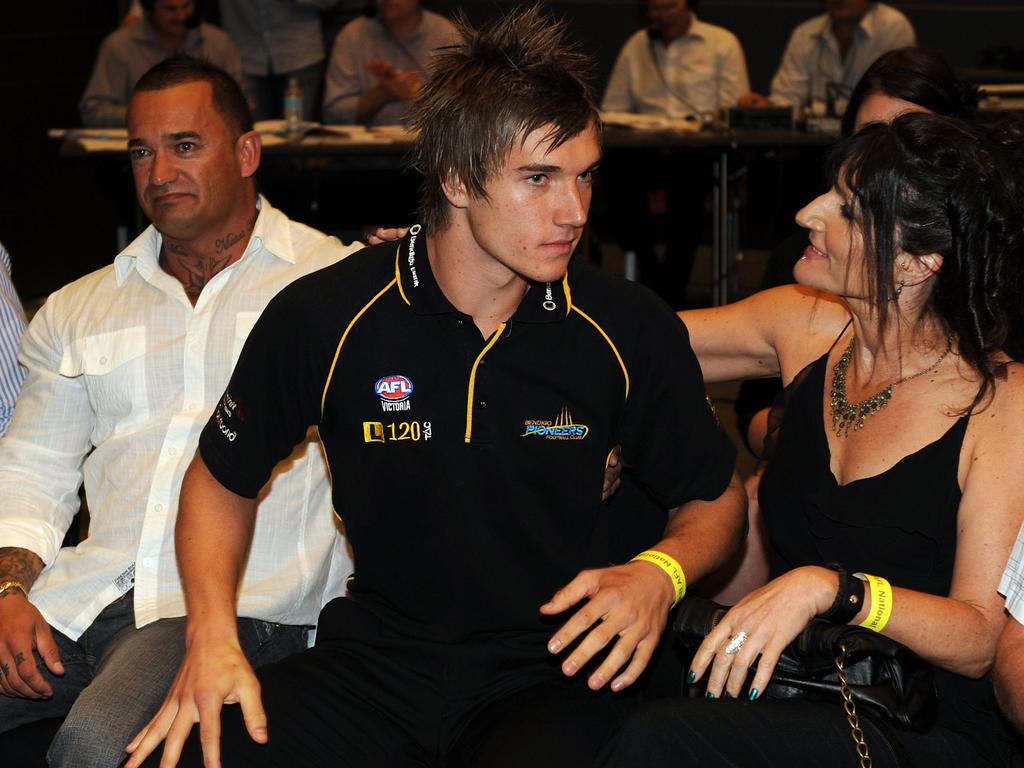 Martin with his dad and mum after his name was called out in the 2009 national draft. Picture: Michael Dodge