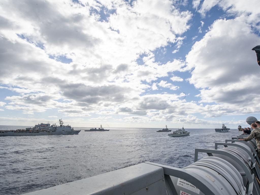 210722-N-XB010-1014 CORAL SEA (July 22, 2021) USS New Orleans (LPD 18), USNS Rappahannock (T-AO 204), ROKS Wang Geon (DD 978), HMAS Parramatta (FFH 154), USS America (LHA 6), HMCS Calgary (FFH 335), USS Rafael Peralta (DDG 115), USS Germantown (LSD 24), JS Makinami (DD 112), and USNS Alan Shepard (T-AKE 3) steam in formation during Talisman Sabre (TS) 21. This is the ninth iteration of Talisman Sabre, a large-scale, bilateral military exercise between Australia and the U.S. involving more than 17,000 participants from seven nations. The month-long multi-domain exercise consists of a series of training events that reinforce the strong U.S./Australian alliance and demonstrate the U.S. MilitaryÃ¢â&#130;¬â&#132;¢s unwavering commitment to a free and open Indo-Pacific. (U.S. Navy photo by Mass Communication Specialist 2nd Class Desmond Parks)