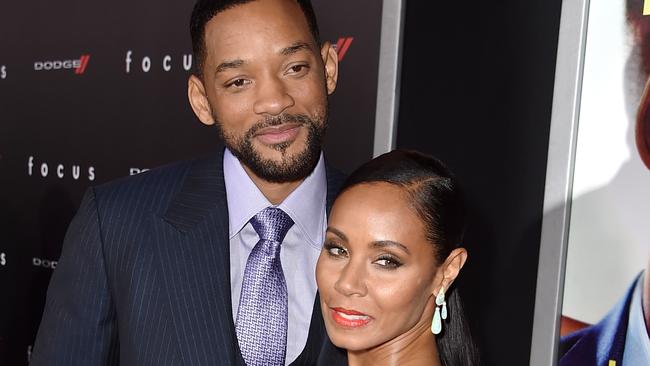 HOLLYWOOD, CA - FEBRUARY 24: Actors Will Smith and Jada Pinkett Smith attend the premiere of Warner Bros. Pictures' 