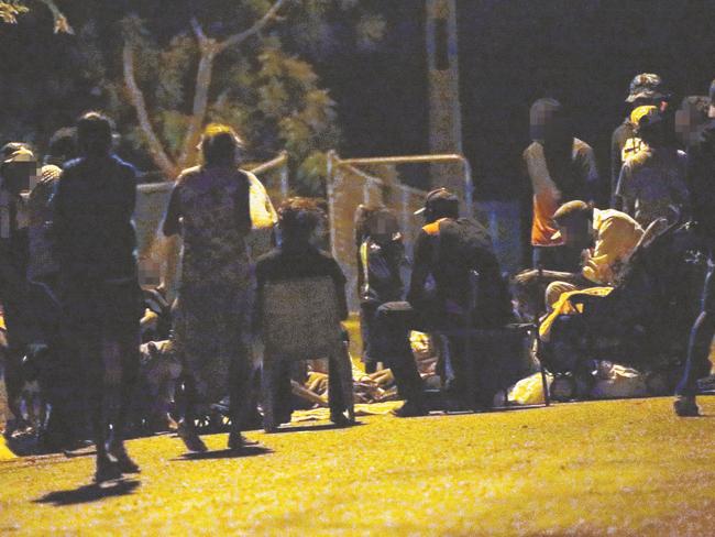 A group of Tennant Creek locals gather in the street late at night.  Picture: Gary Ramage