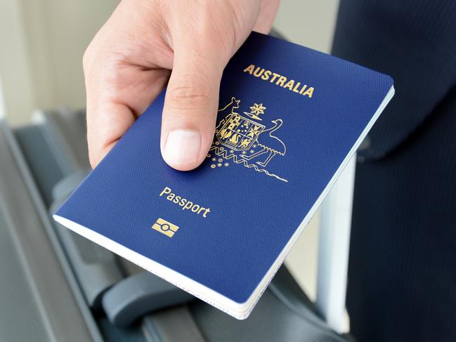 Hands giving passport (of Australia)