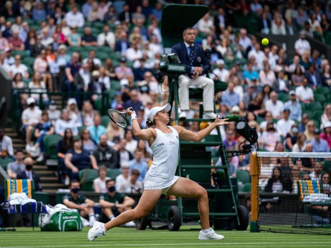 Ash Barty prepares to smash during her Wimbledon first round victory over Carla Suarez Navarro. Picture: Getty Images