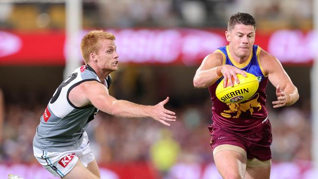 Lions skipper Dayne Zorko gets away from a Port Adelaide opponent in Brisbane’s weekend win at the Gabba. Picture: Russell Freeman/AFL Photos via Getty Images