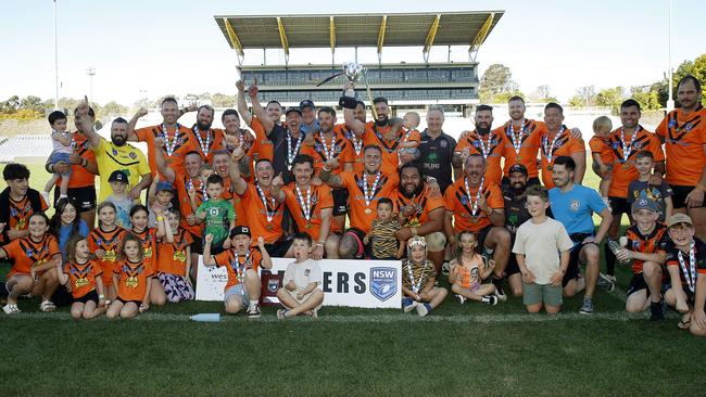 The Oaks Tigers celebrate their 26-10 grand final victory. Picture: John Appleyard