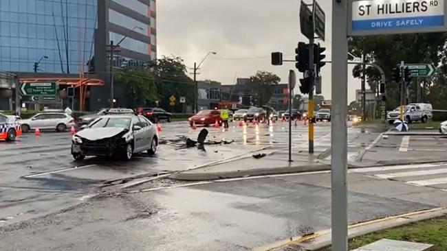 A bike collided with two taxis following a police pursuit in Auburn. Picture: 9News