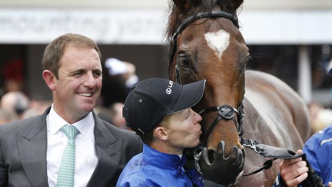 Jockey Kerrin McEvoy kisses Cross Counter after winning the Melbourne Cup. Picture: David Caird