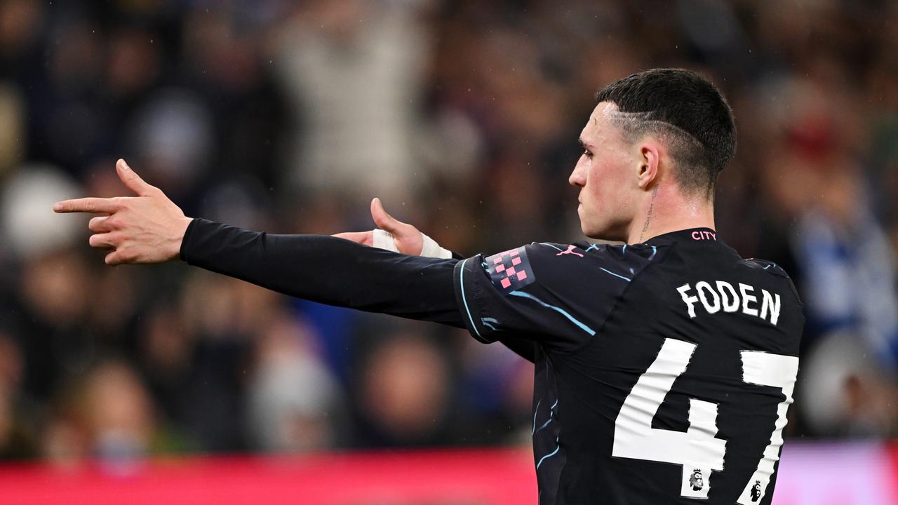 BRIGHTON, ENGLAND - APRIL 25: Phil Foden of Manchester City celebrates scoring his team's third goal during the Premier League match between Brighton &amp; Hove Albion and Manchester City at American Express Community Stadium on April 25, 2024 in Brighton, England. (Photo by Mike Hewitt/Getty Images)