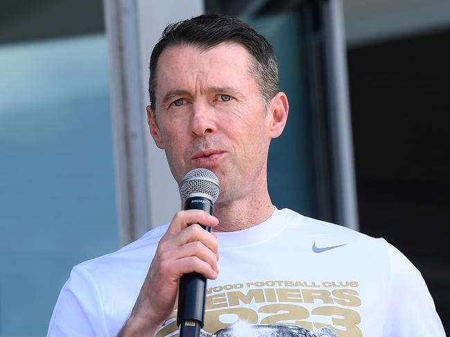 MELBOURNE, AUSTRALIA - OCTOBER 01: Magpies head coach Craig McRae speaks on stage during the Collingwood Magpies AFL Grand Final celebrations fan day at AIA Centre on October 01, 2023 in Melbourne, Australia. (Photo by Quinn Rooney/Getty Images)