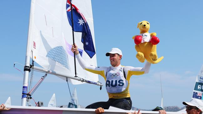 MARSEILLE, FRANCE - AUGUST 07: Matt Wearn of Team Australia celebrates with friends and team mates after winning the Gold medal in the Men's Dinghy ILCA class on day twelve of the Olympic Games Paris 2024 at Marseille Marina on August 07, 2024 in Marseille, France. (Photo by Alex Livesey/Getty Images)