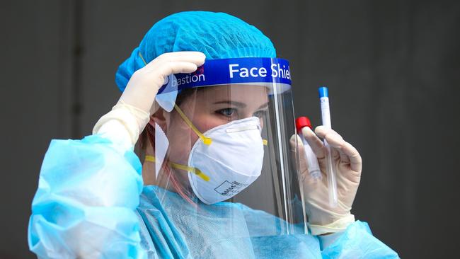 A nurse is seen working at a Covid-19 pop-up testing clinic in Auburn Town Centre in southwest Sydney as case numbers continue to rise. Picture: NCA NewsWire/Gaye Gerard