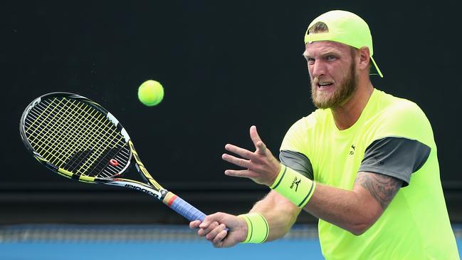 Former tennis star Sam Groth has lashed out at complaints from AFL players