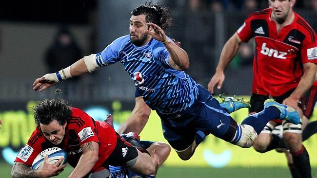 Waratahs recruit Jacques Potgieter is airborne before making a tackle during his stint at the Bulls.