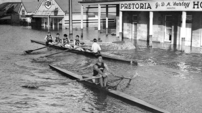 Rowers make the most of the 1956 floods in Mannum.