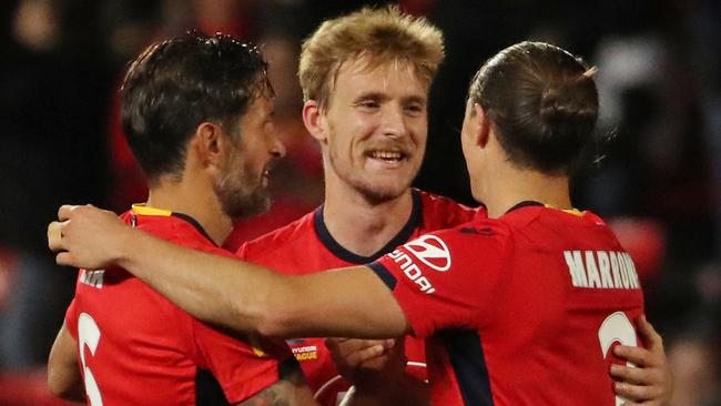 Ben Halloran is congratulated by his teammates at full time after scoring the winning goal during the A-League Elimination Final match.