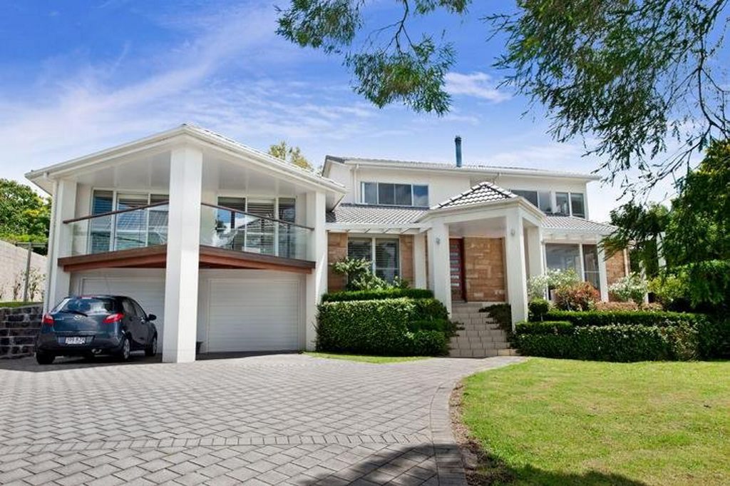 This 43 Curtis St property features an outdoor living area with a sandstone-paved gazebo and heated pool. Picture: Contributed