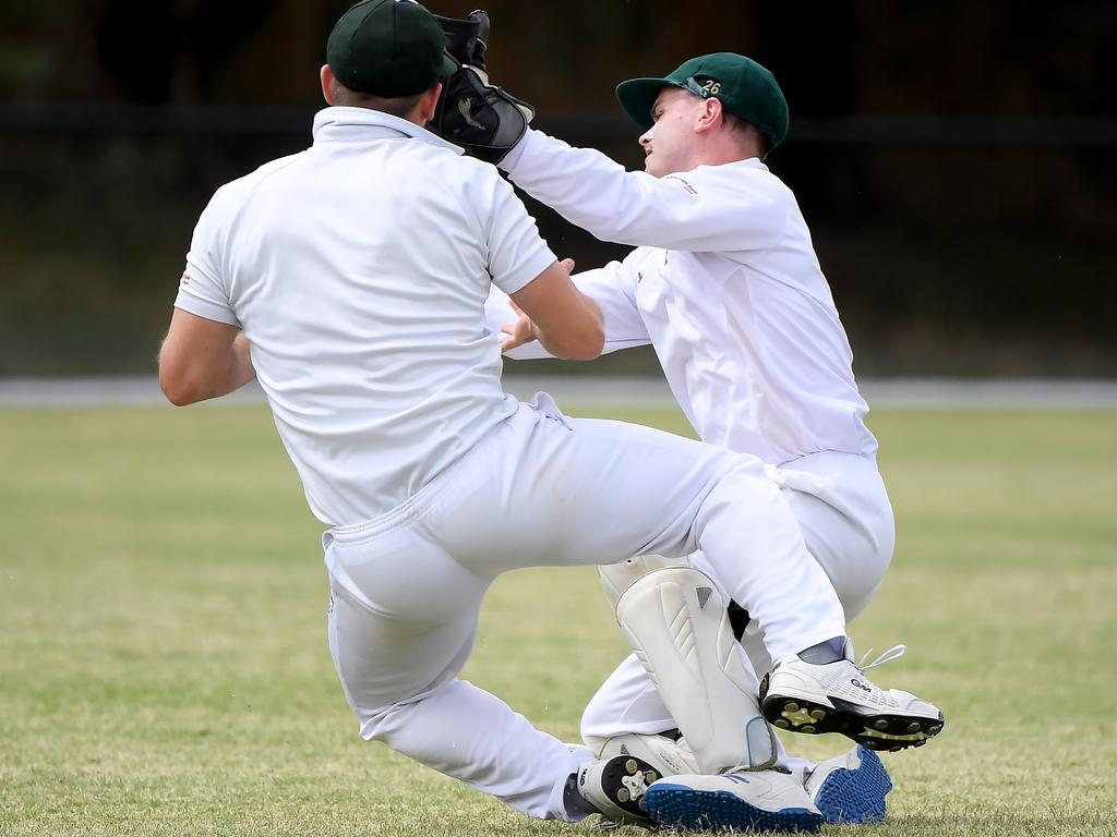 DVCA - Mine or Yours? North Eltham Wanderers pair Adam Tsapatsaris and Jake Hedley collide in the field. Picture: Andy Brownbill