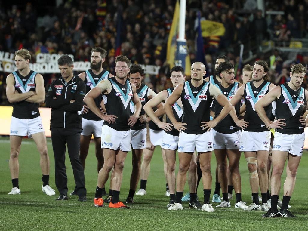 Disconsolate Port Adelaide players after the loss. Picture SARAH REED