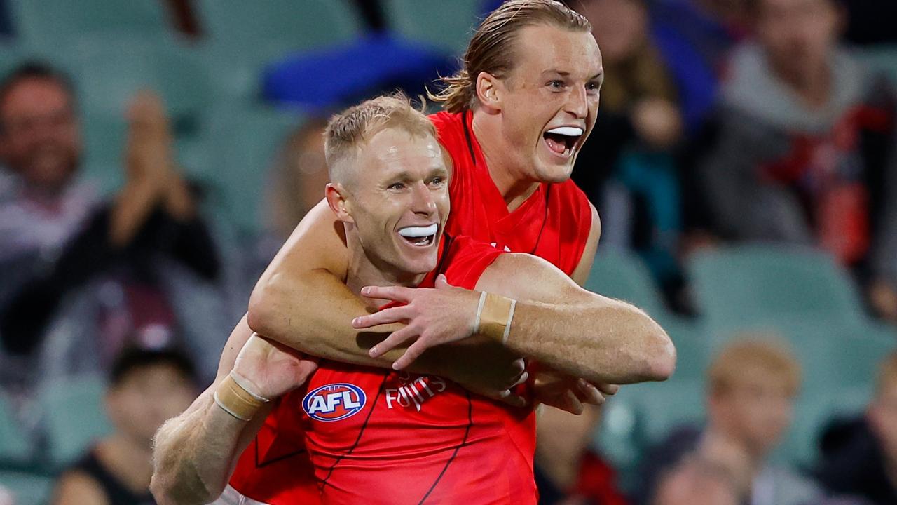 Bombers duo Nick Hind and Mason Redman celebrate a goal. Picture: Dylan Burns