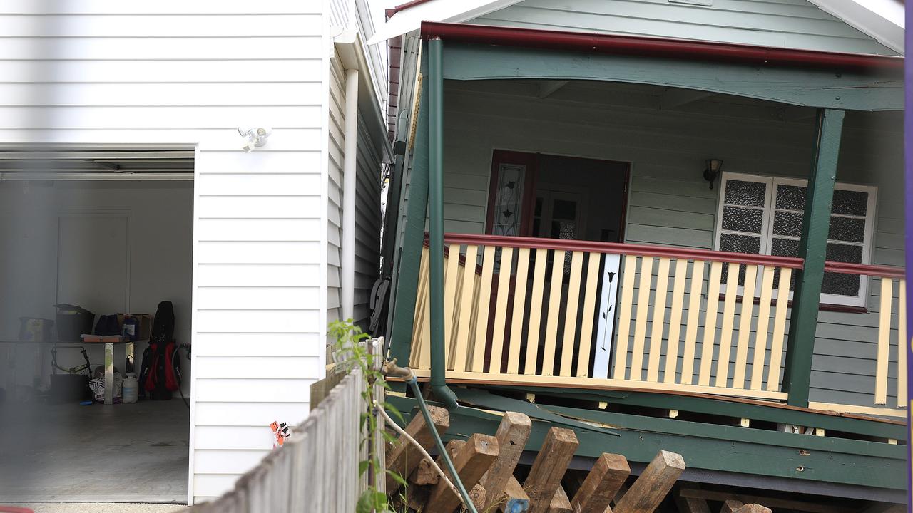 A house has slammed into a next door property after falling off its temporary supports. Picture: Adam Head